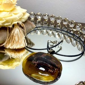 Handmade glass pedant necklace.